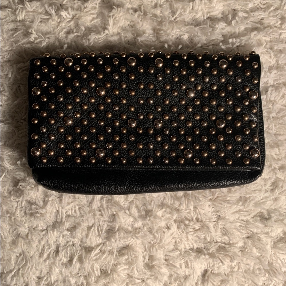 Black studded clutch